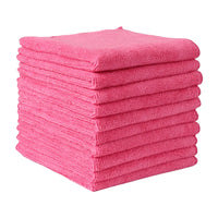 Pile de chiffons en microfibre roses ultra absorbants pour le ménage et la poussière.