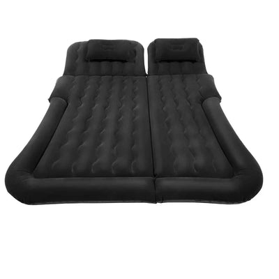 Matelas gonflable de voiture noir avec deux compartiments séparés, oreillers intégrés et structure alvéolée pour le confort du dos.